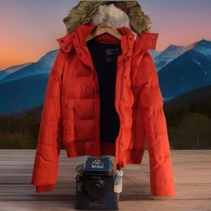 A&E  Vibrant Orange Puffer Jacket with Faux Fur Hood